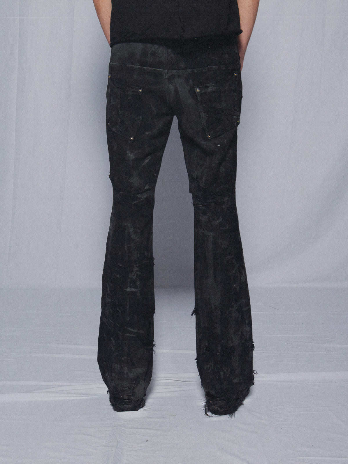 BLACK FLARED WAXED DENIM