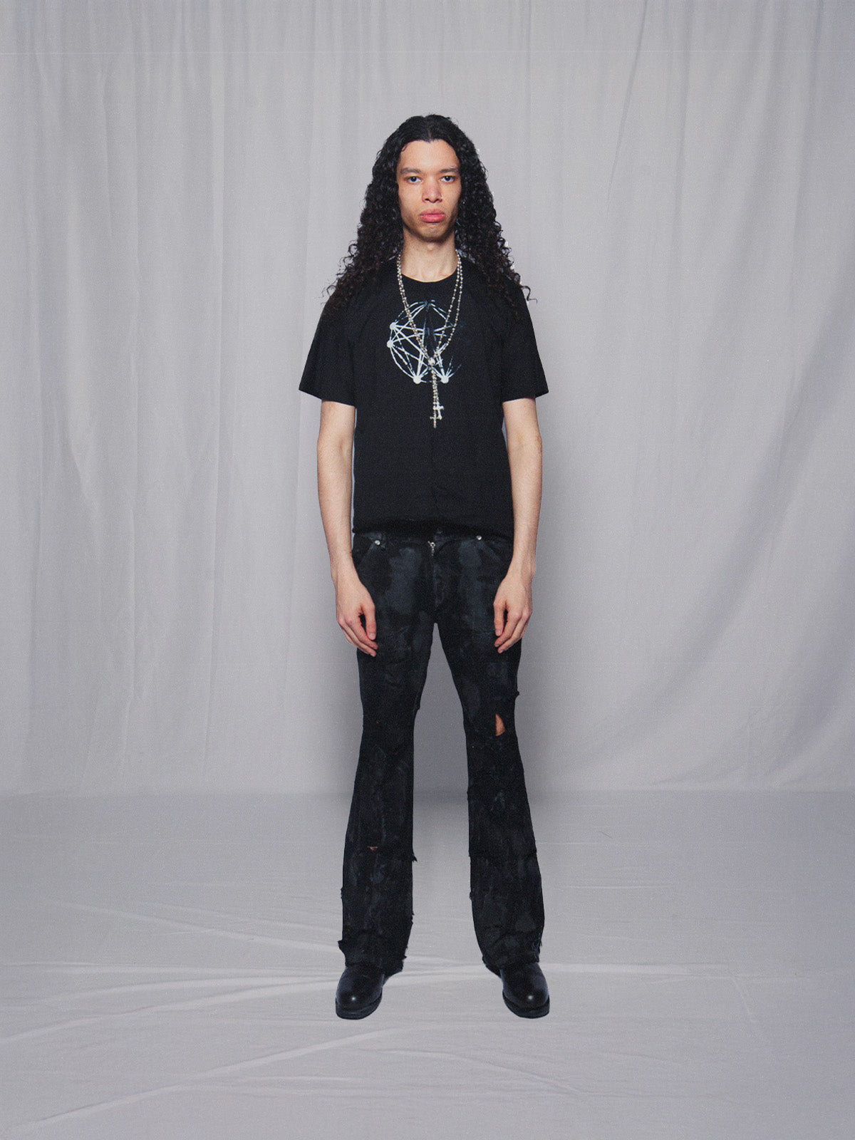 BLACK FLARED WAXED DENIM